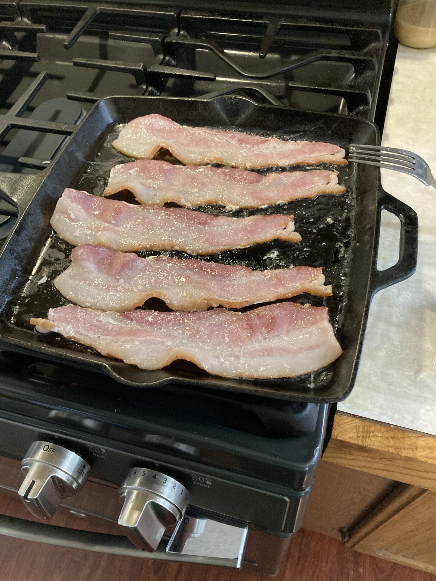 Pre-cooking some bacon for my…