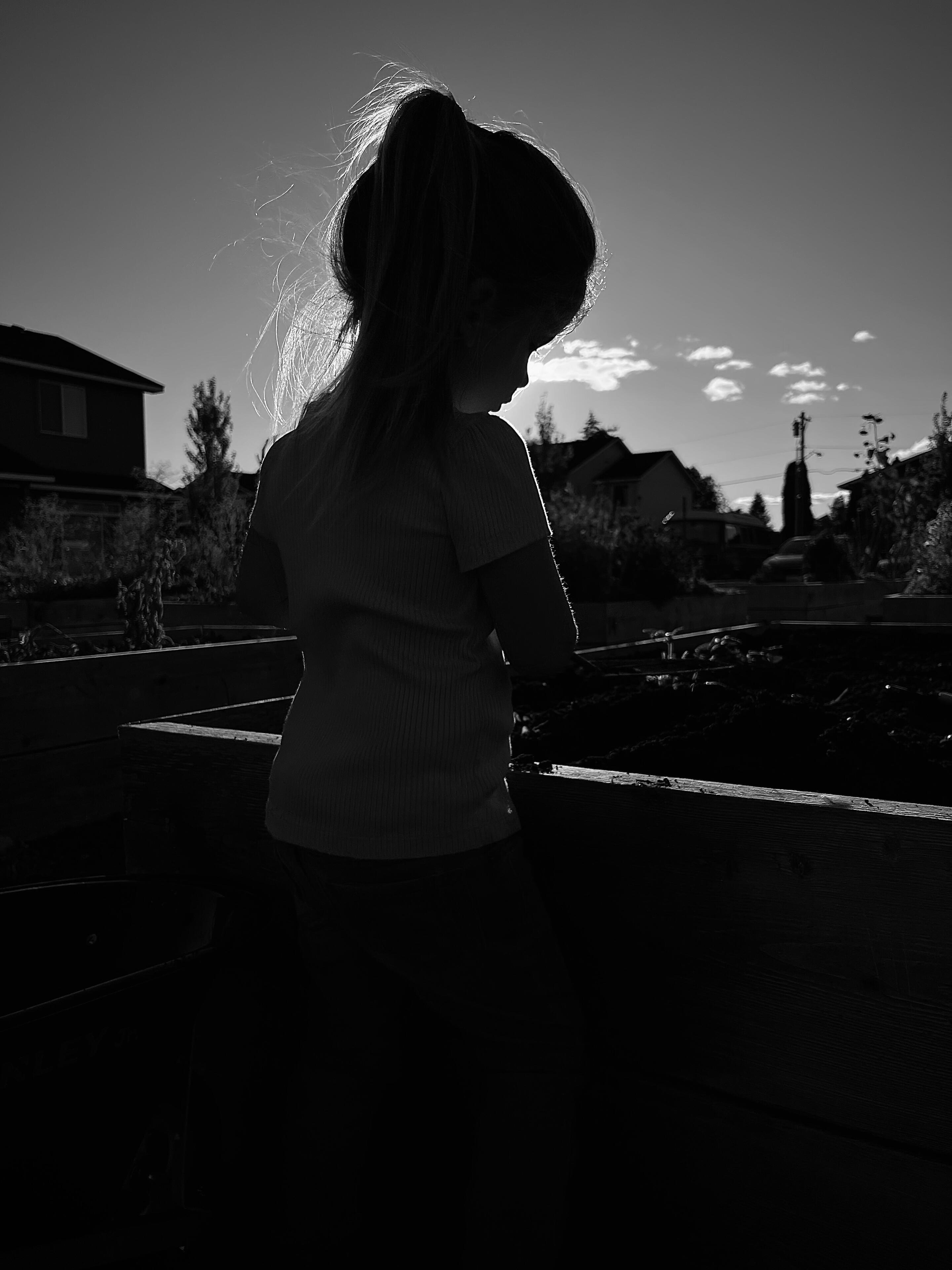 My daughter’s silhouette against the…