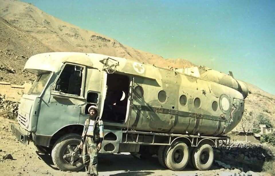 An Afghani man poses with his…