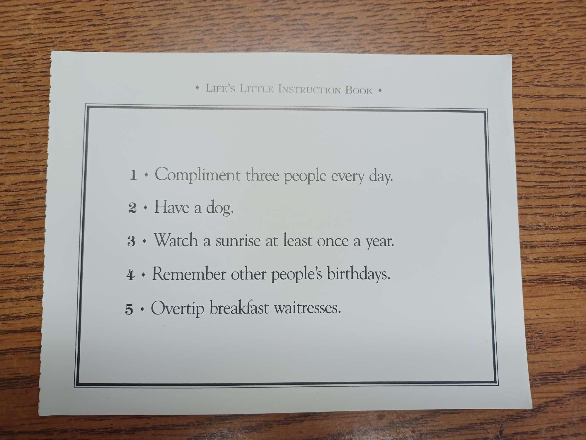 Thumbing through "Life's Little Instruction…
