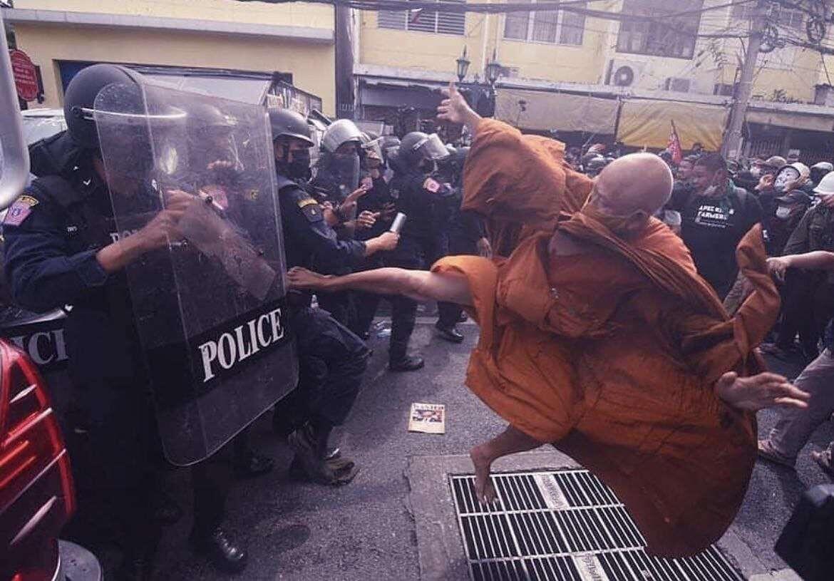 Thailand monk kicking police during a…