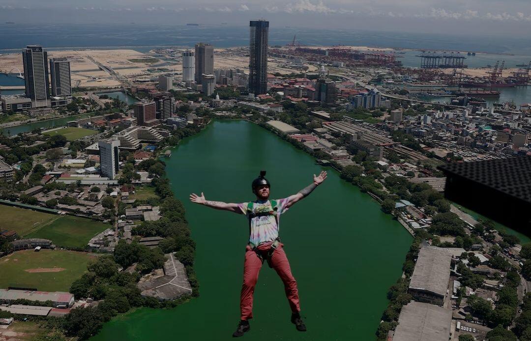 A base jumper leaps off the…