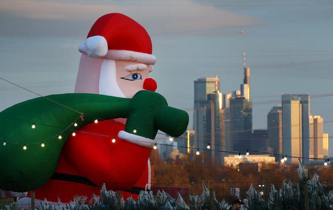 A huge inflatable Santa Claus figure…