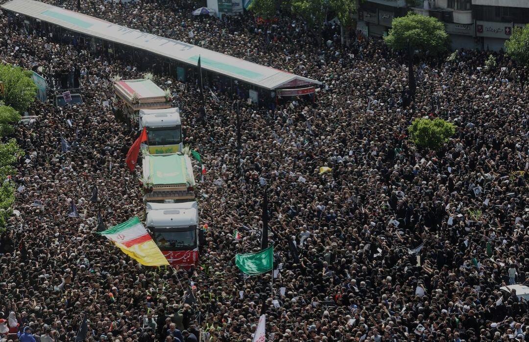 Mourners attend the funeral for victims…