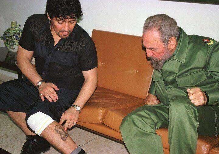 Diego Maradona shows a tattoo depicting…