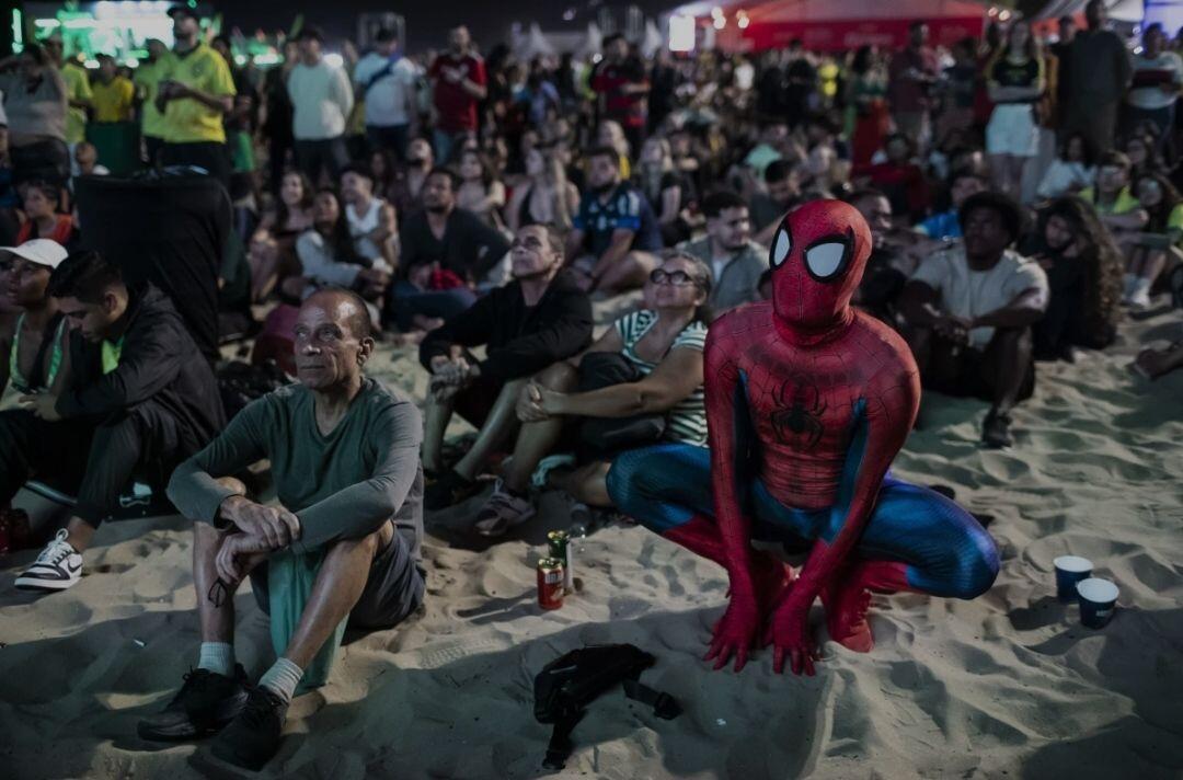 Football fan dressed in a Spiderman…