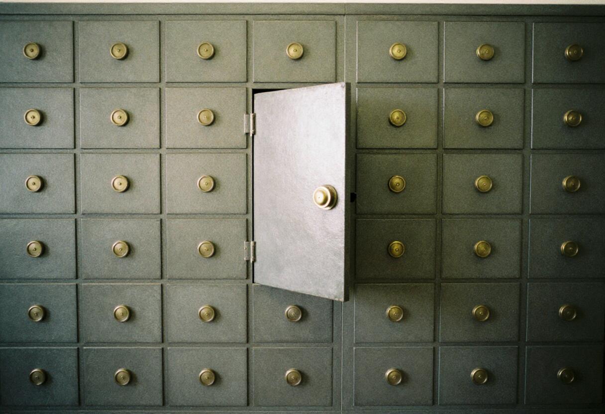 Safe deposit boxes: the older answer to holding value outside a bank’s ledger.