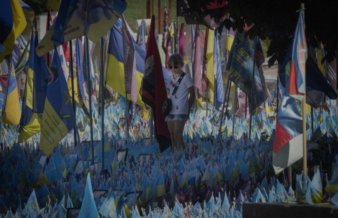 Flags brought by relatives, each bearing…